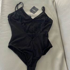 Black lace bodysuit brand new.